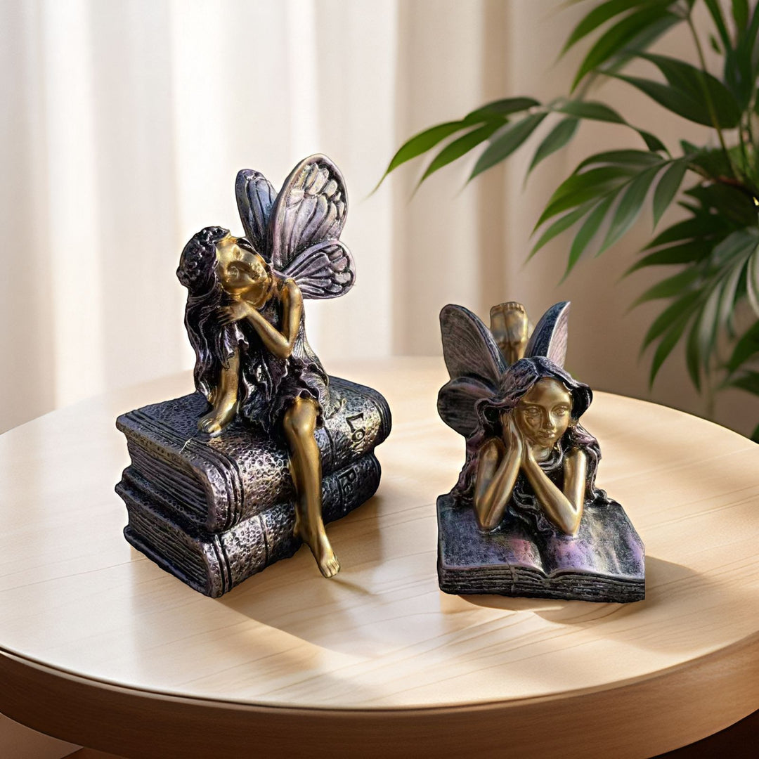 Fairy Figurine Sitting on Books Stornfield