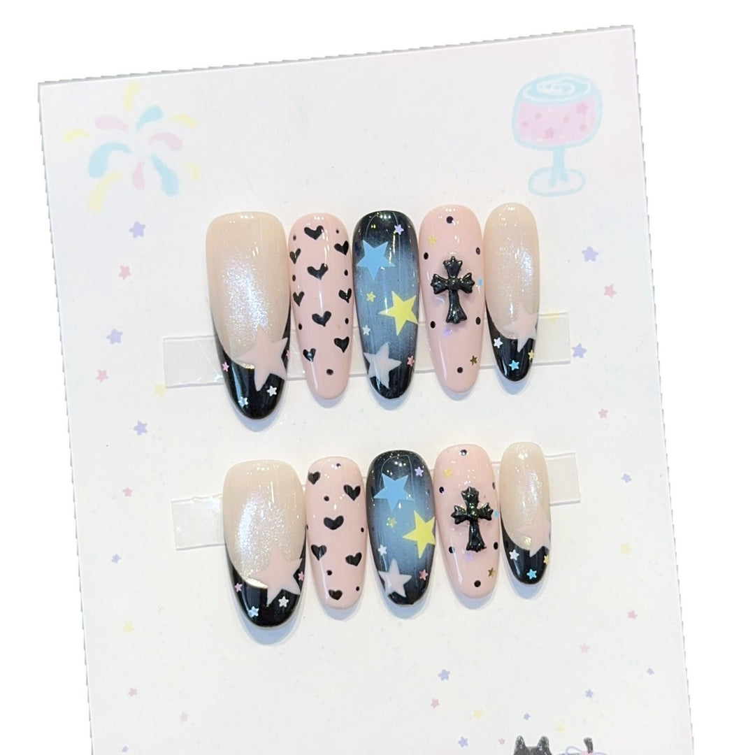 Artificial nail tips with playful star and heart designs Stornfield