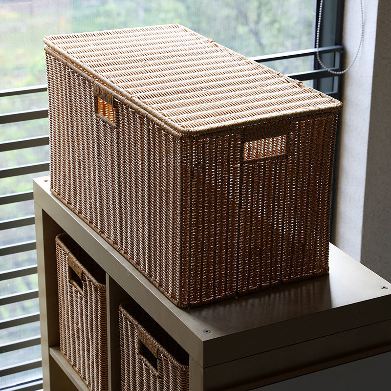 Unisex storage basket made of natural material with practical handles Stornfield
