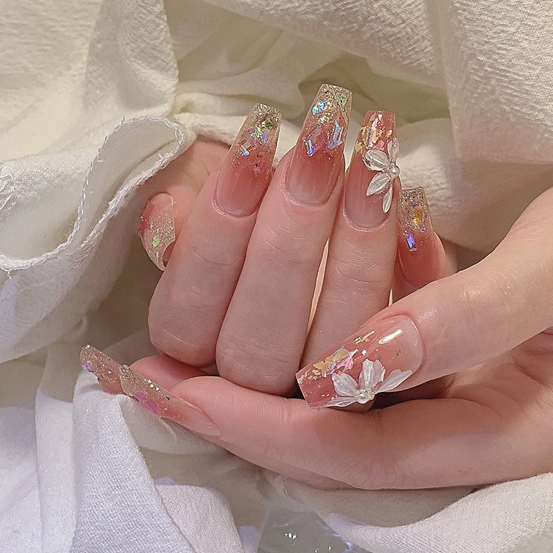 Artificial nail set with floral and glittering accents Stornfield