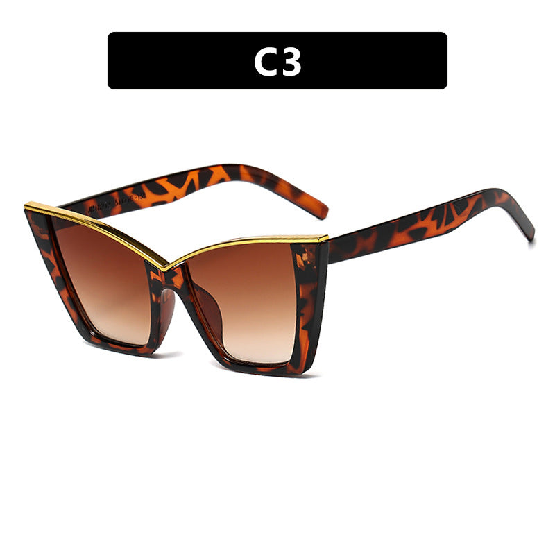 Women extravagant sunglasses with unique design and golden accents Stornfield