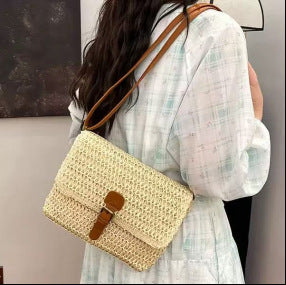 Handbag made of woven natural material with leather accents Stornfield