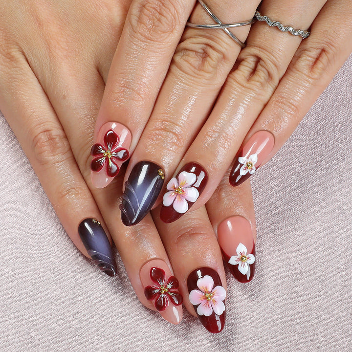 Acrylic nail set with floral accents and luxurious decorations Stornfield