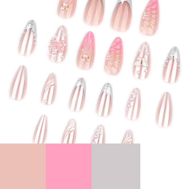 Artful stiletto nails with floral and glitter accents Stornfield
