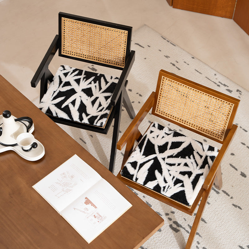 Padded seat cushion with hand-tufted leaf pattern and fastening ties Stornfield