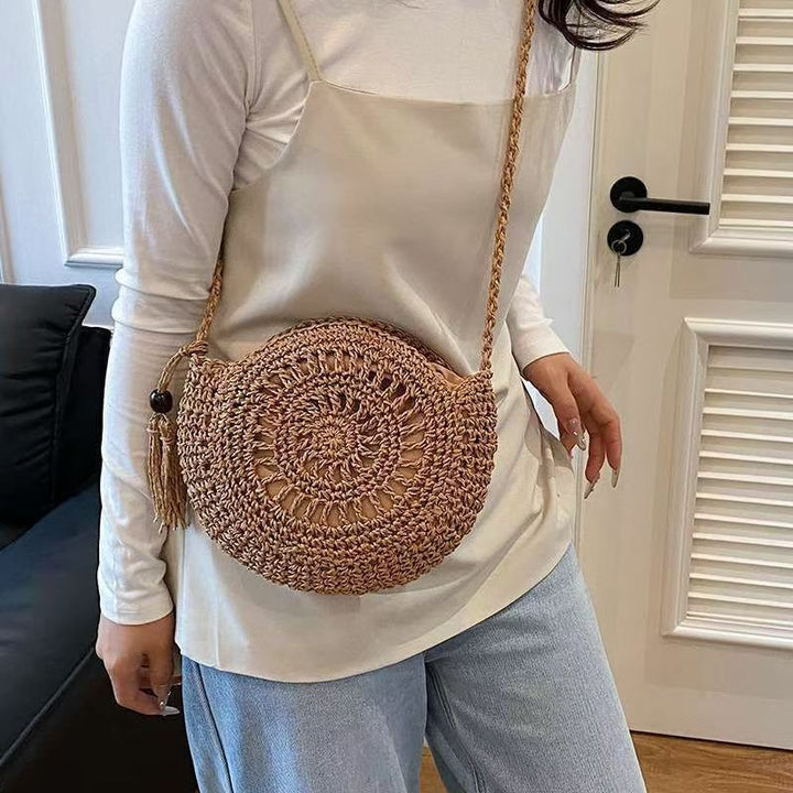 Hand-knotted round shoulder bag made of natural materials Stornfield