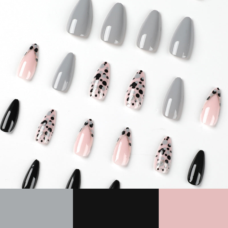 Artful stiletto nails with elegant accent design Stornfield