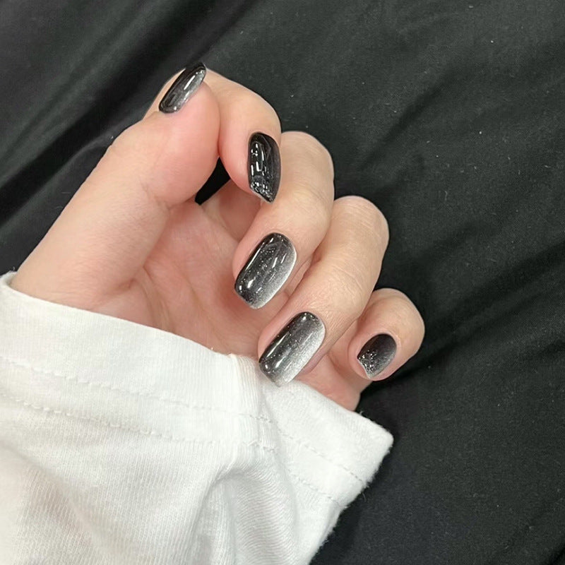 Artifical nail set with glamorous ombre effect and glitter embellishments Stornfield