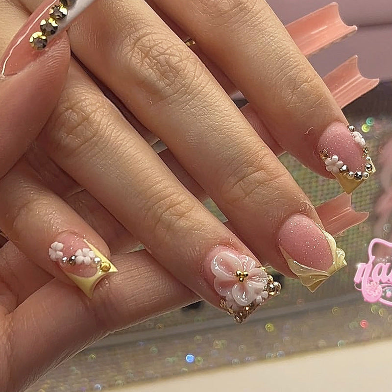 Nail art set with glamorous glitter and flower accents Stornfield