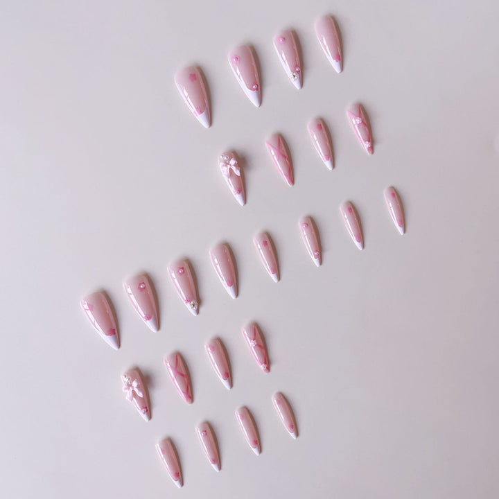 False nail set with playful 3D details and elegant accents Stornfield