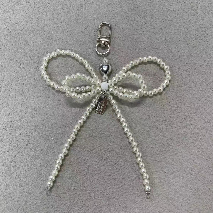 Elegant Pearl Bow Keychain Stornfield