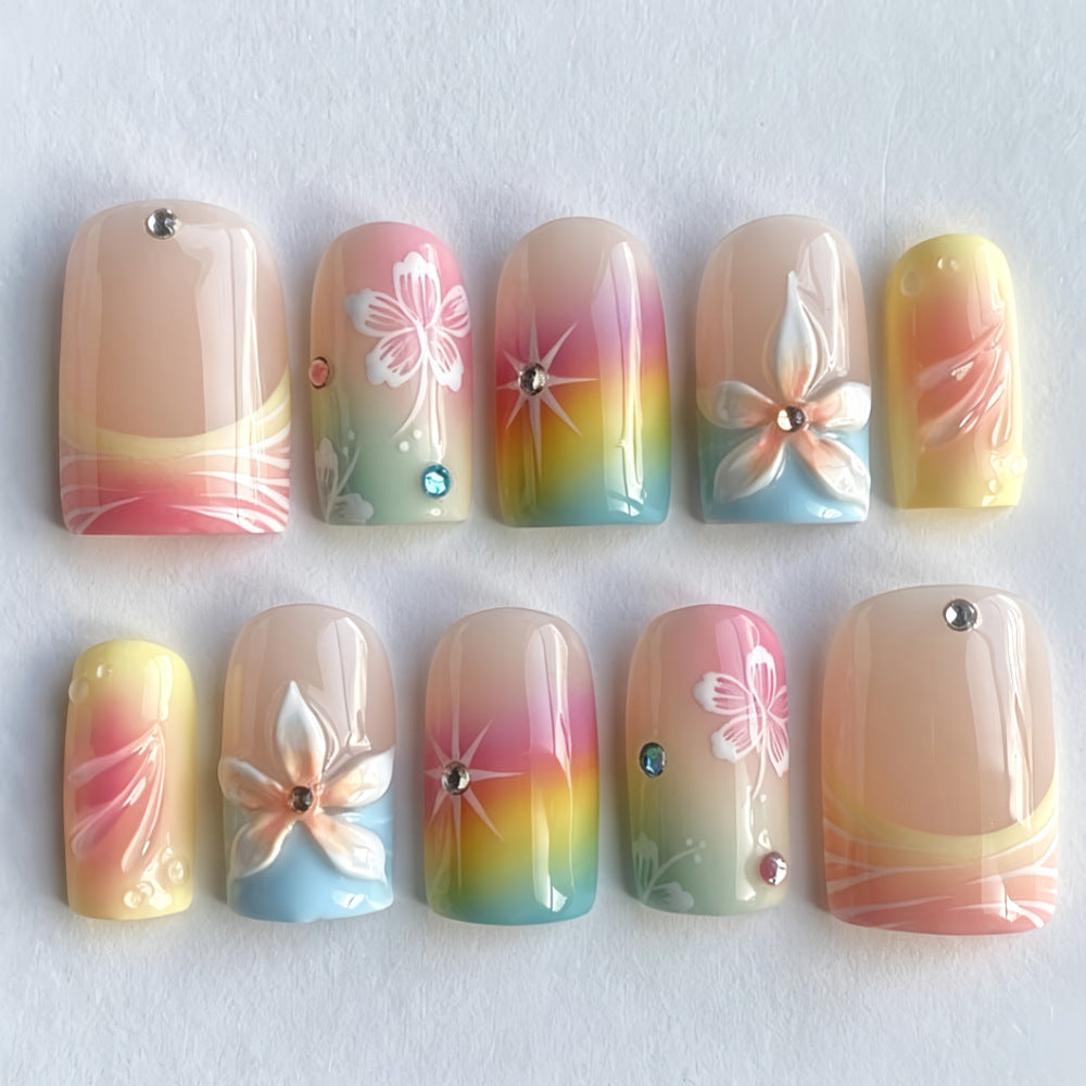 Artful Nail Tips with Floral Accents Stornfield