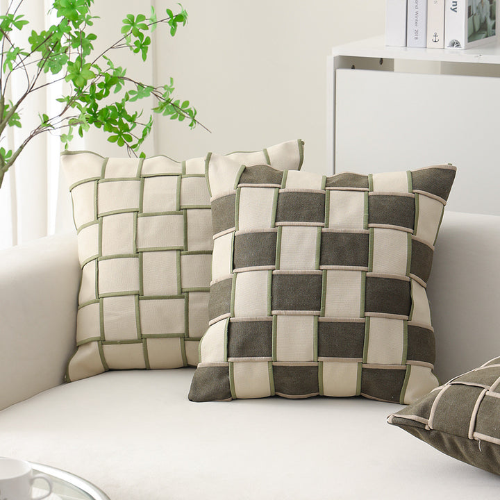 woven decorative pillow with braided square pattern