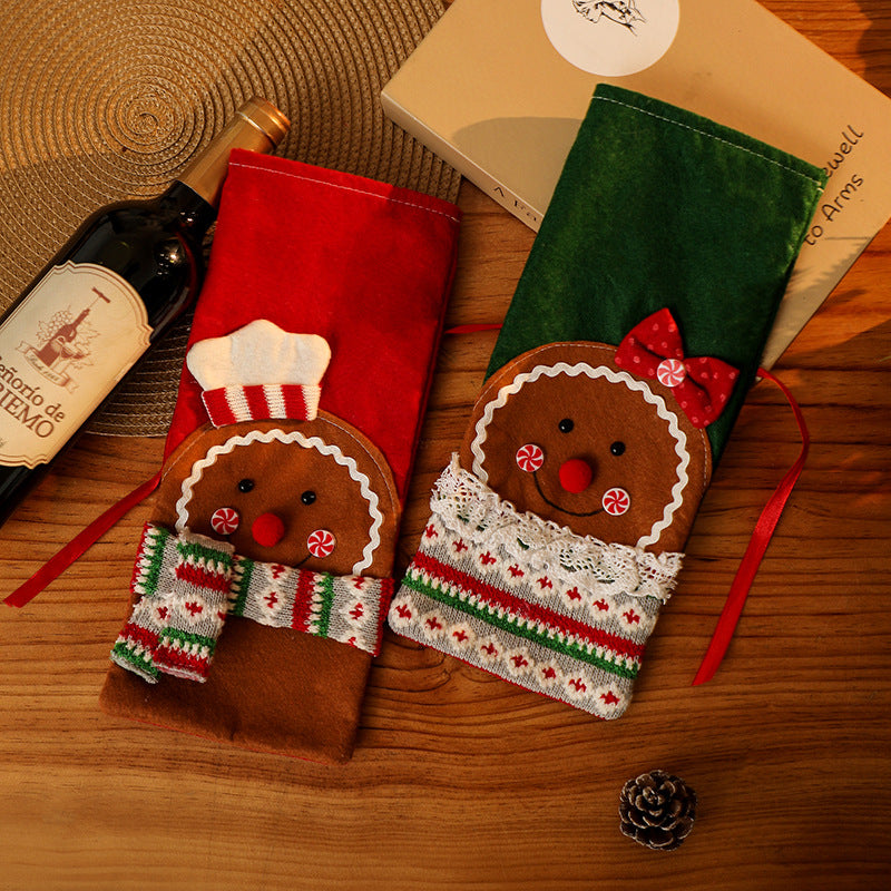 Decorative wine bottle cover in gingerbread man design Stornfield