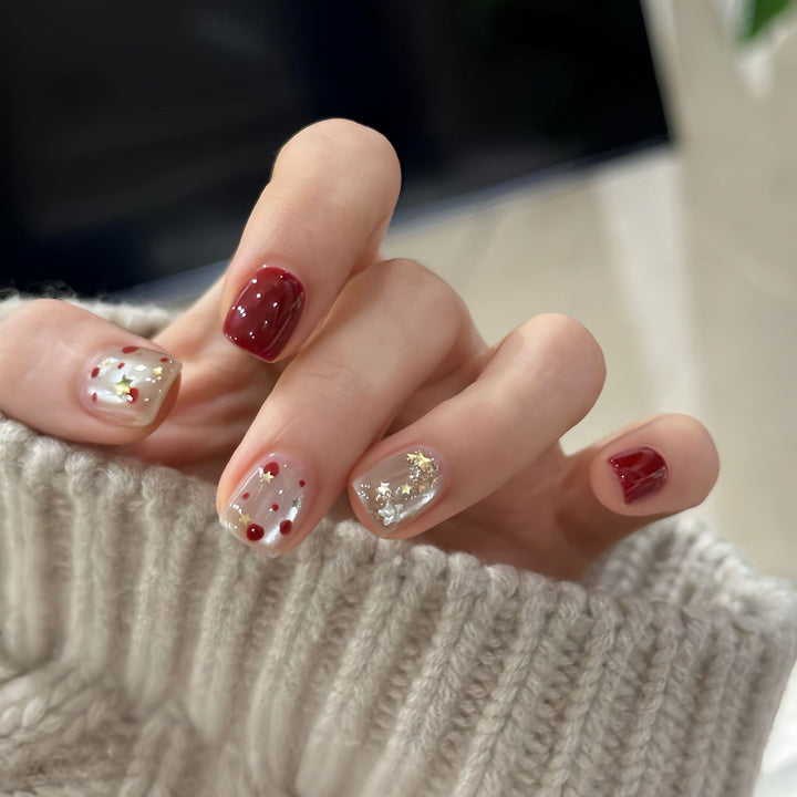 Nail set with sparkling glitter details and creative designs Stornfield