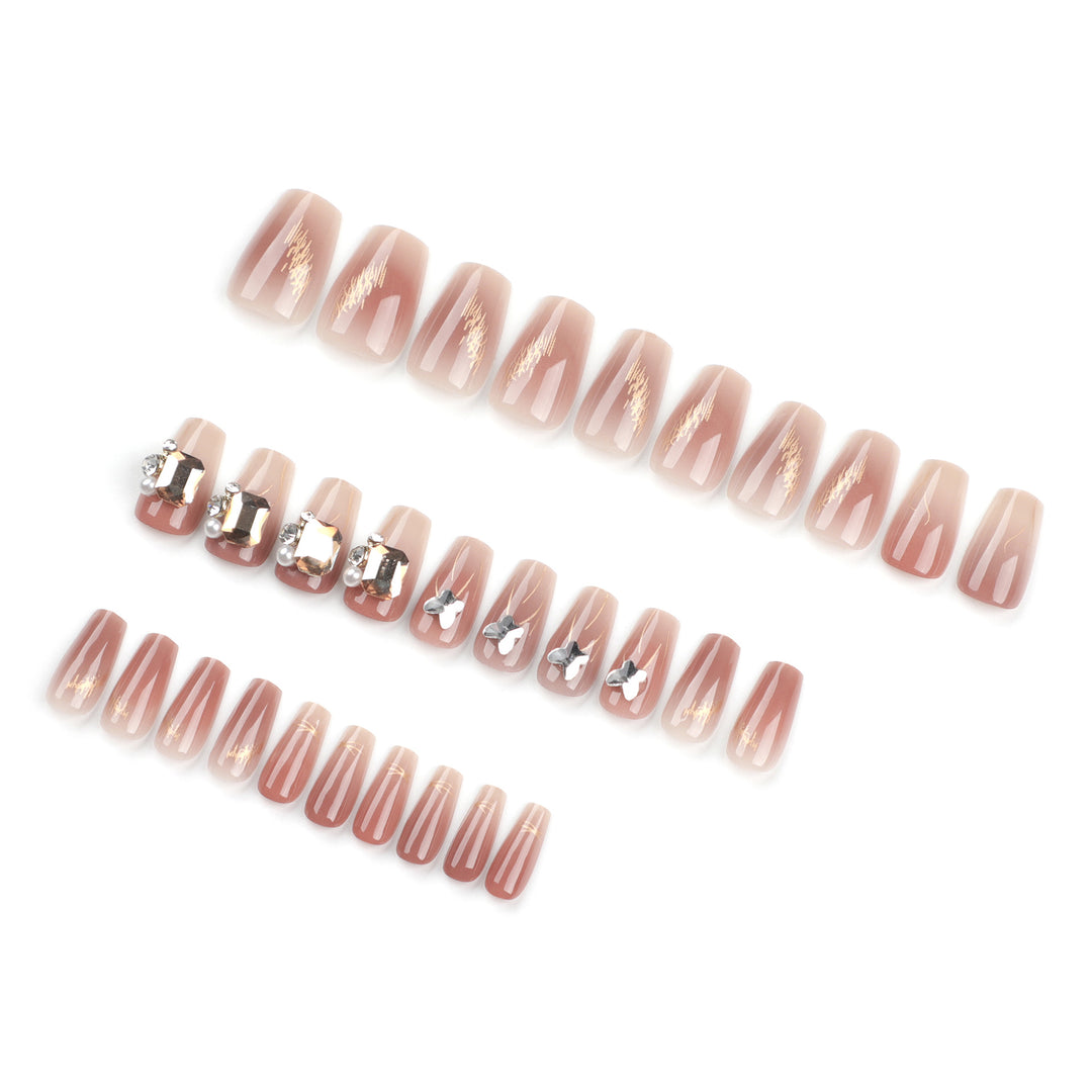 Artificial nail art with elegant jewelry accents Stornfield