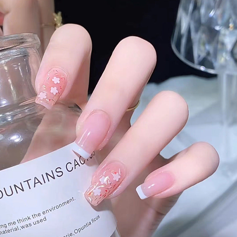 Nail art set with floral decorations and elegant French design Stornfield