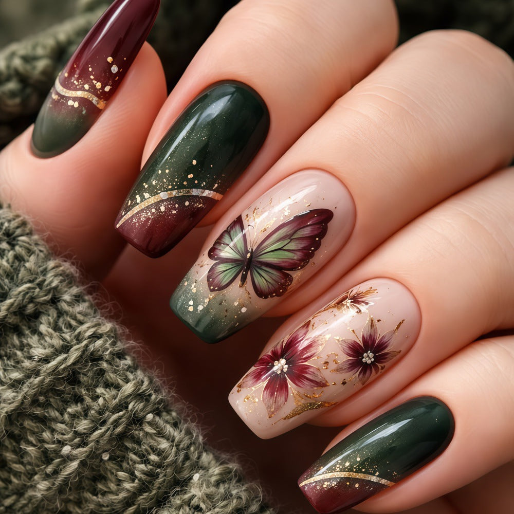 Artificial nails with elaborate butterfly and flower designs Stornfield