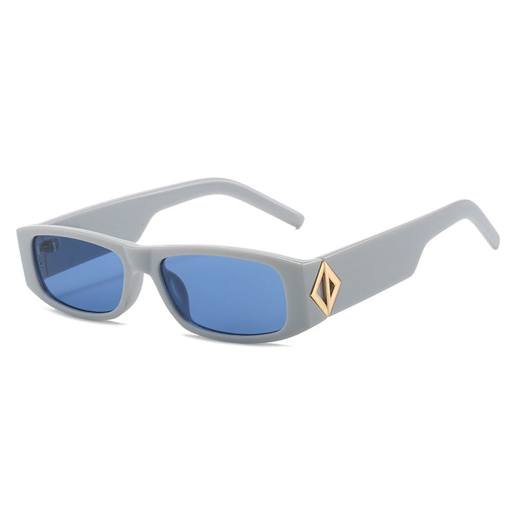 Ladies fashionable sunglasses with asymmetrical frame and gold-colored details Stornfield