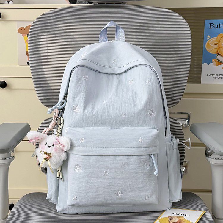 Playful backpack with fine embroidery Stornfield