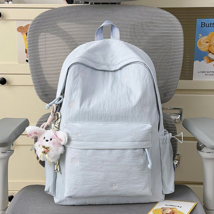 Playful backpack with fine embroidery Stornfield