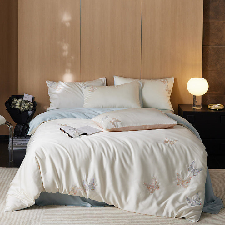 Reversible bedding set made of cotton percale with finely embroidered breakfast motifs