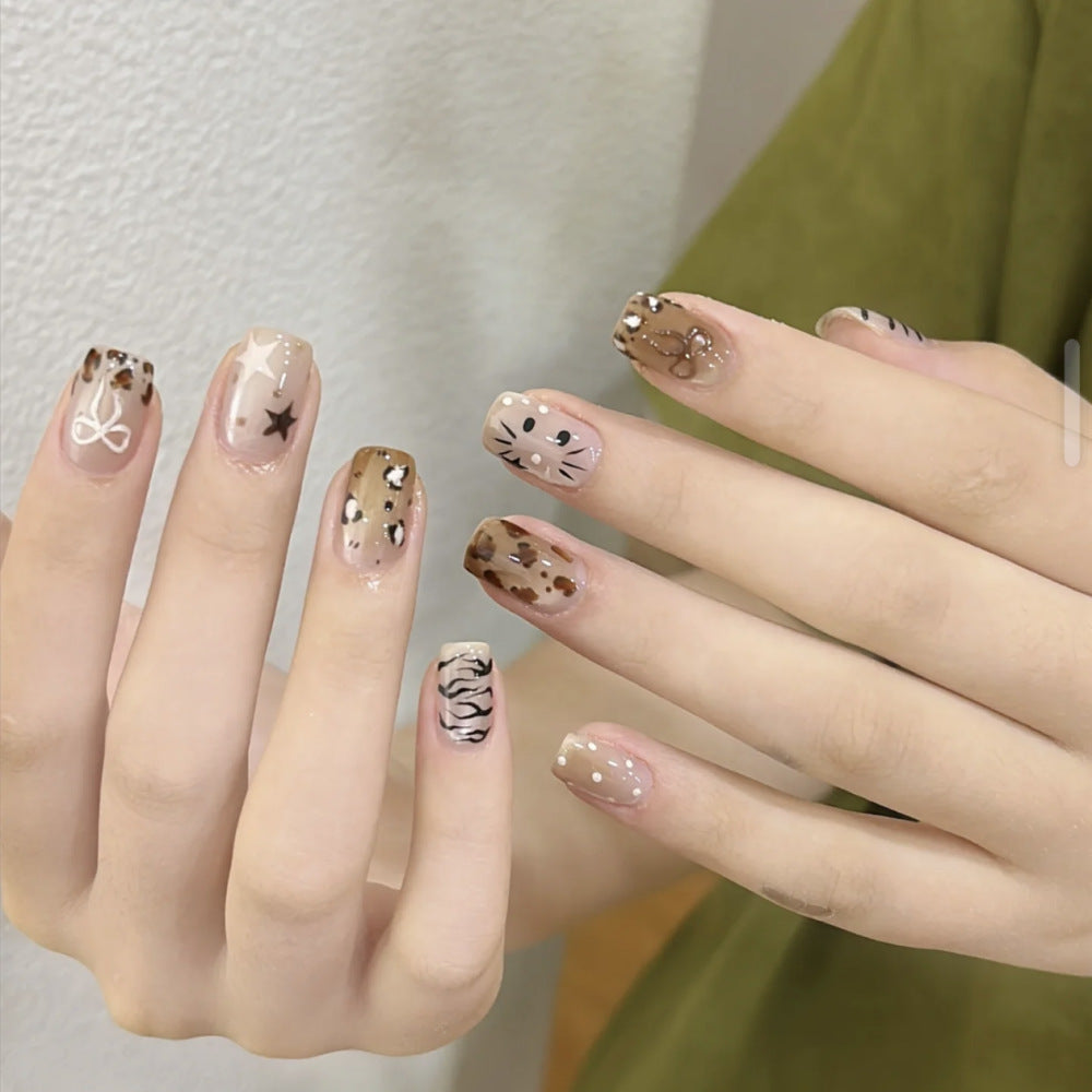 Decorative Long Stiletto Press-On Nails with Heart and Floral Accents Stornfield