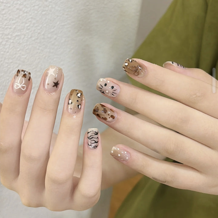 Decorative Long Stiletto Press-On Nails with Heart and Floral Accents Stornfield