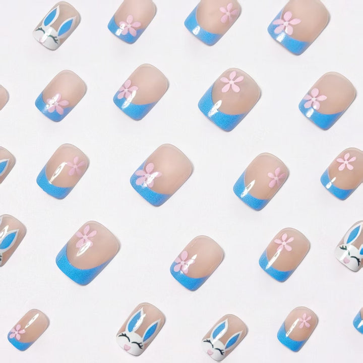 Creative nail art with cheerful bunny and flower pattern Stornfield