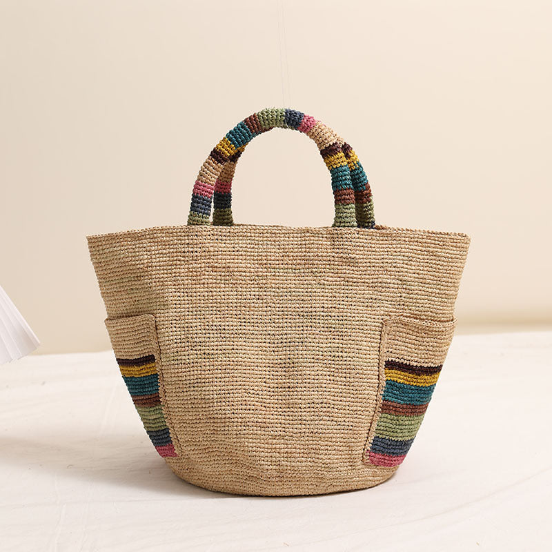 Handcrafted basket bag with colorful stripe accents Stornfield