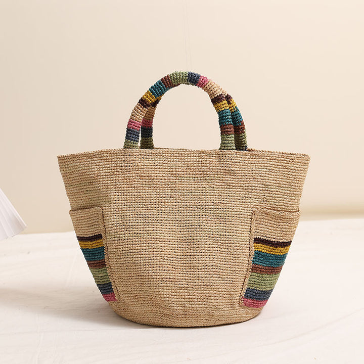 Handcrafted basket bag with colorful stripe accents Stornfield