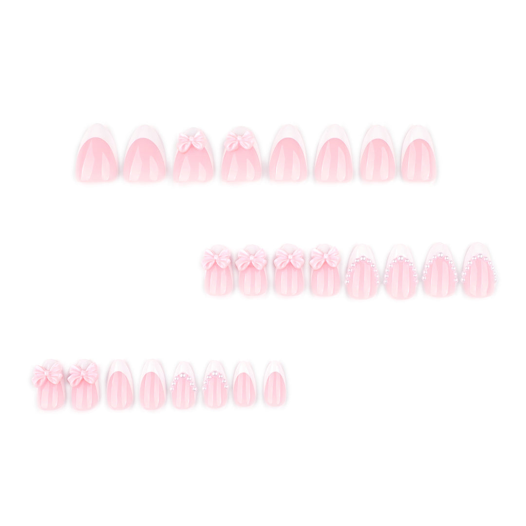 Artful Stiletto Nails with Delicate Bow Accents Stornfield