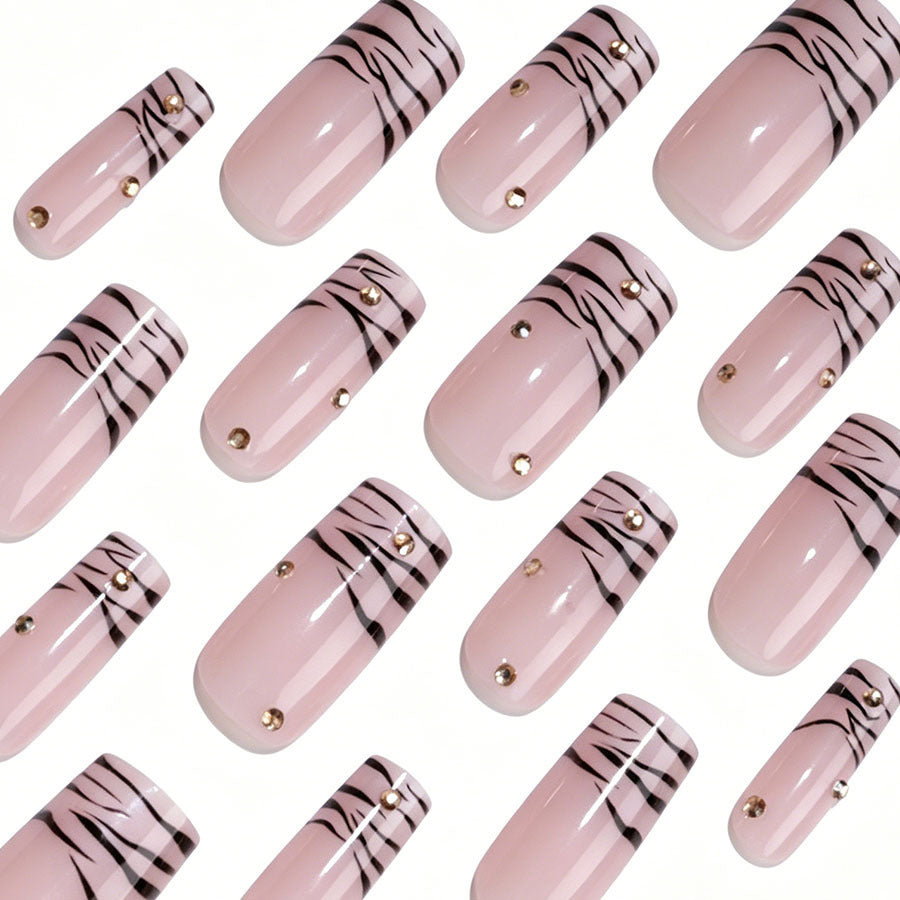 Art nail set with elegant lines and glitter accents Stornfield