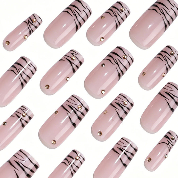 Art nail set with elegant lines and glitter accents Stornfield
