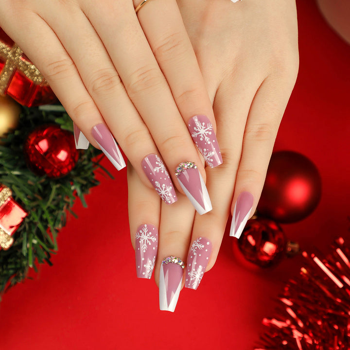Artistic Nail Extensions with Snowflake Design and Glitter Accents Stornfield