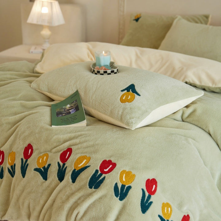Plush duvet cover set with embroidered tulips, cozy teddy fleece, reversible function, and matching pillowcases
