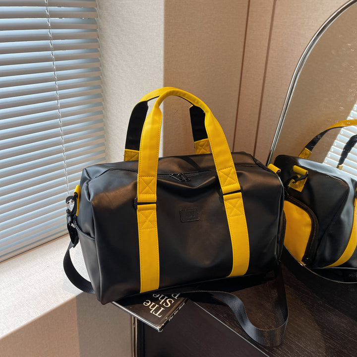 Sporty duffel bag with durable water-repellent material and versatile carrying options Stornfield