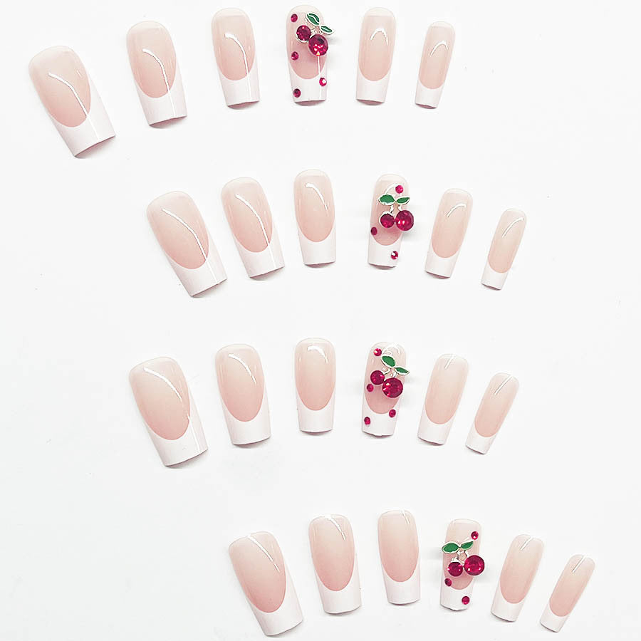 Acrylic nail set with chic cherry motifs and elegant French tip Stornfield