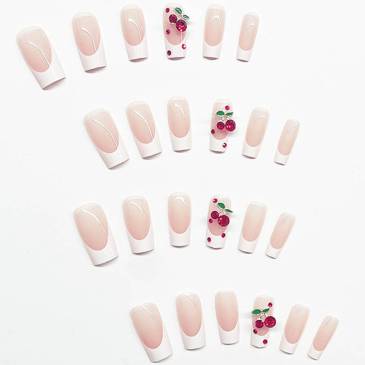 Acrylic nail set with chic cherry motifs and elegant French tip Stornfield