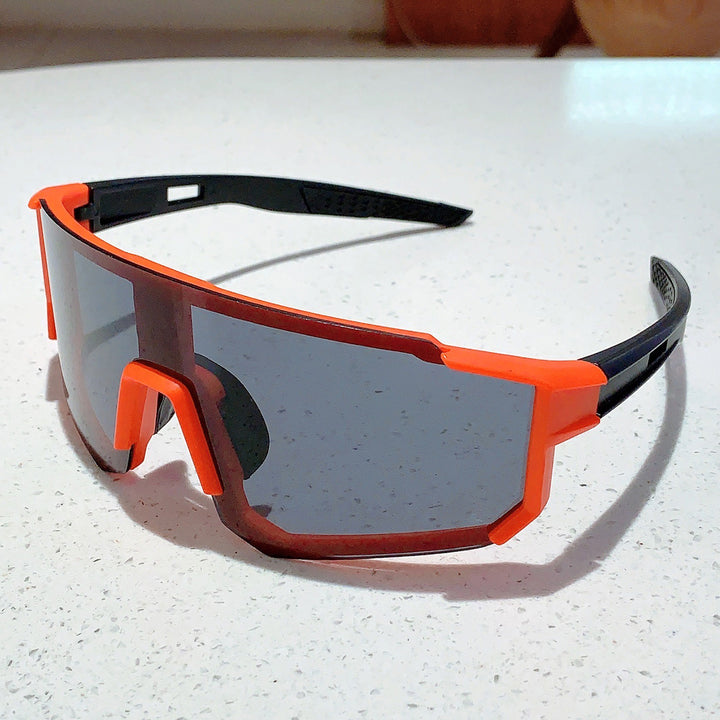 Unisex nan sporty shield sunglasses with continuous mirror lens and adjustable nose bridge Stornfield