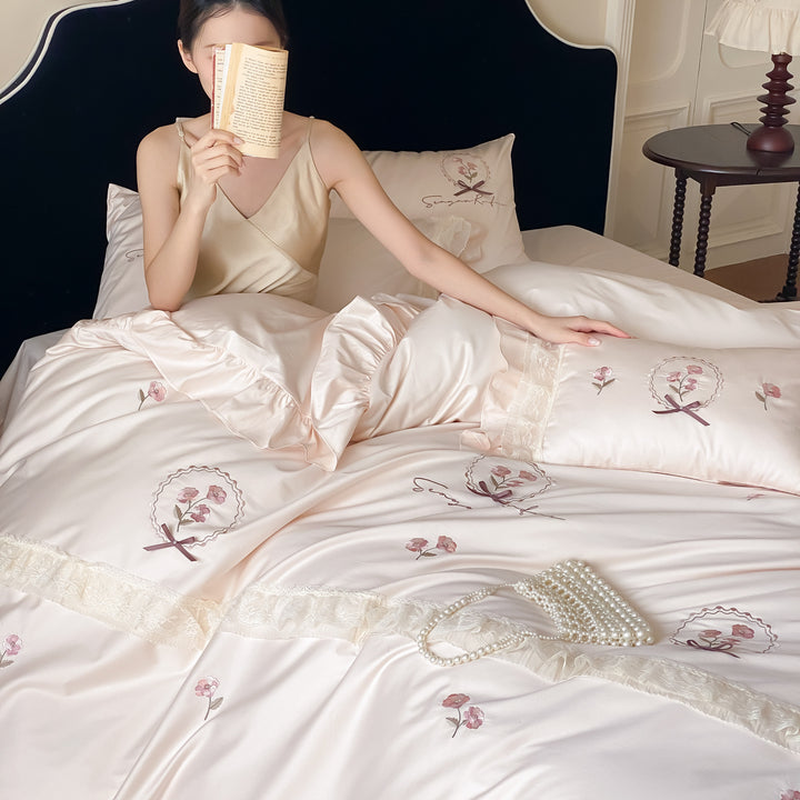 Bedding set made of cotton satin with frill ruffle, delicate flower embroidery and pillowcases