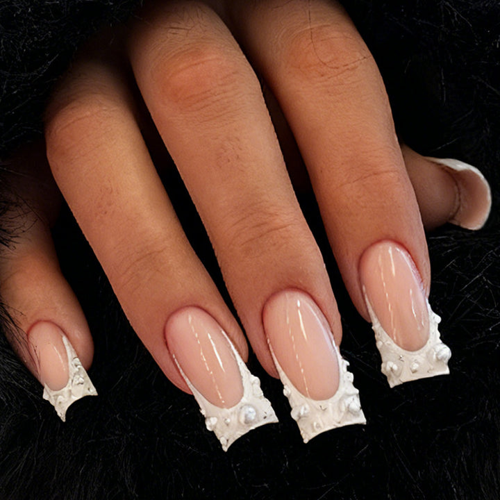 Artificial nails with elegant pearl accents Stornfield