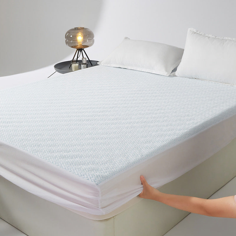 Non-slip tension mattress protector with climate-regulating jacquard surface