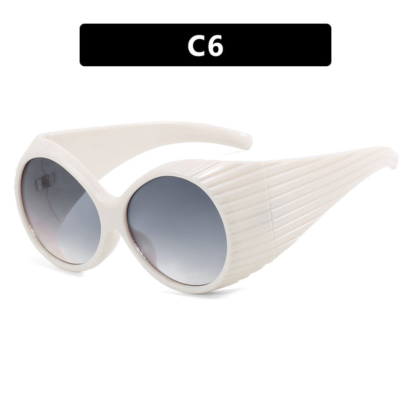 Women's extravagant sunglasses with curved frame Stornfield