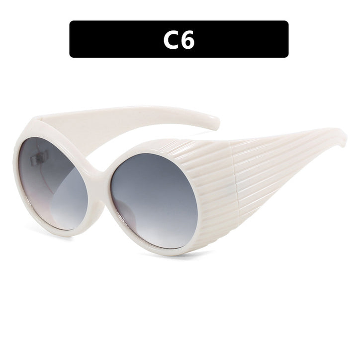 Women's extravagant sunglasses with curved frame Stornfield