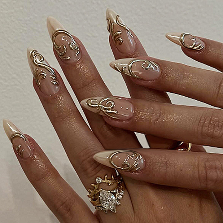 Acrylic nail set with elegant golden decorations Stornfield