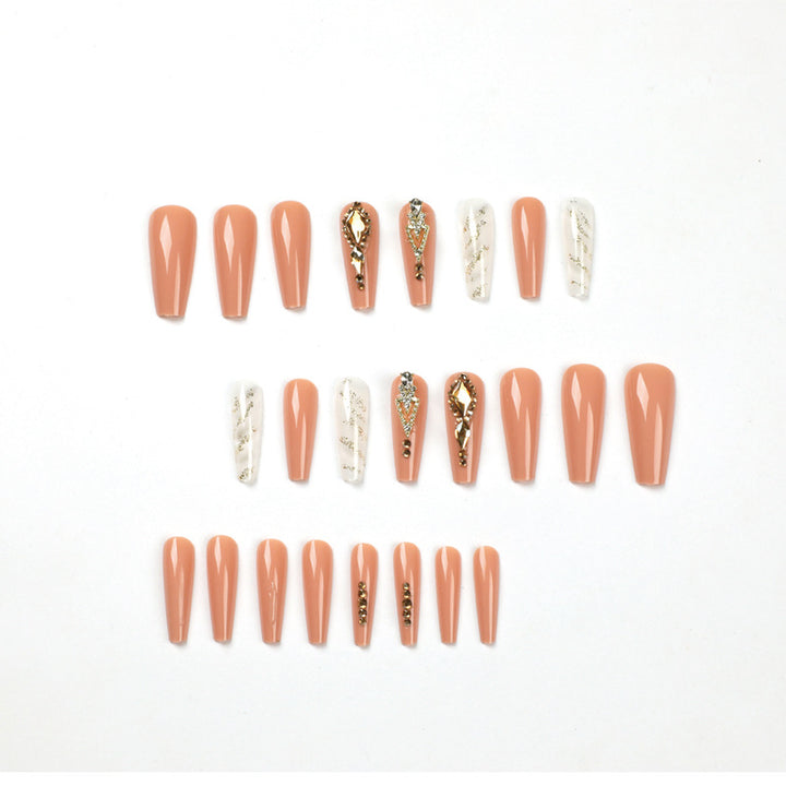 Artful nail extensions with glitter embellishments and delicate accents Stornfield