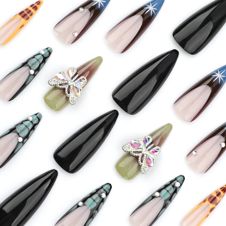 Artful nail extensions with elegant designs and glitter Stornfield