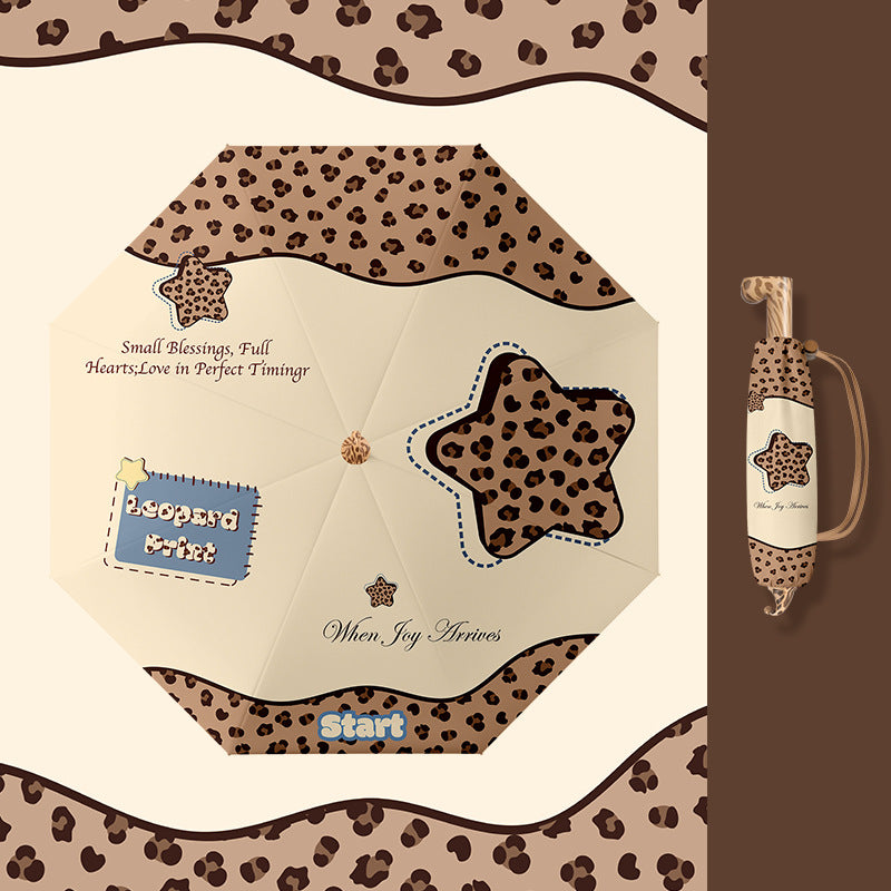 Ladies folding umbrella with playful design Stornfield