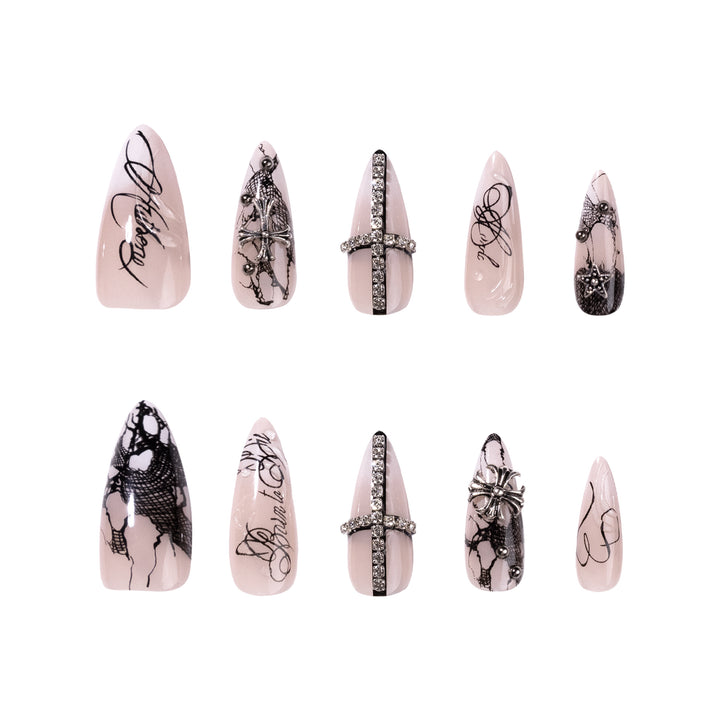 Artful stiletto nails with elegant embellishments Stornfield